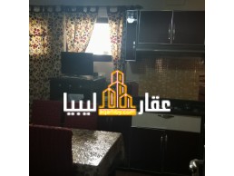 شقة للبيع في عمارات الضواحي تاجوراء بجوار مسجد الفاروق